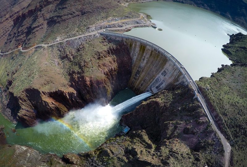 Owyhee Project. Aerial of Owyhee Dam and Morning Glory Ring Gate, also known as the Glory hole. Heavy water year. Heavy spill .  04-04-2017 BOR Photo by Kirsten Strough.